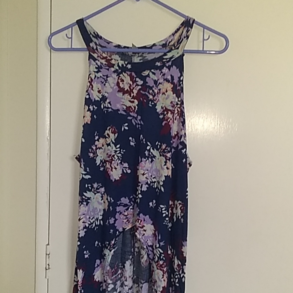 Floral crop top from front, long in the back